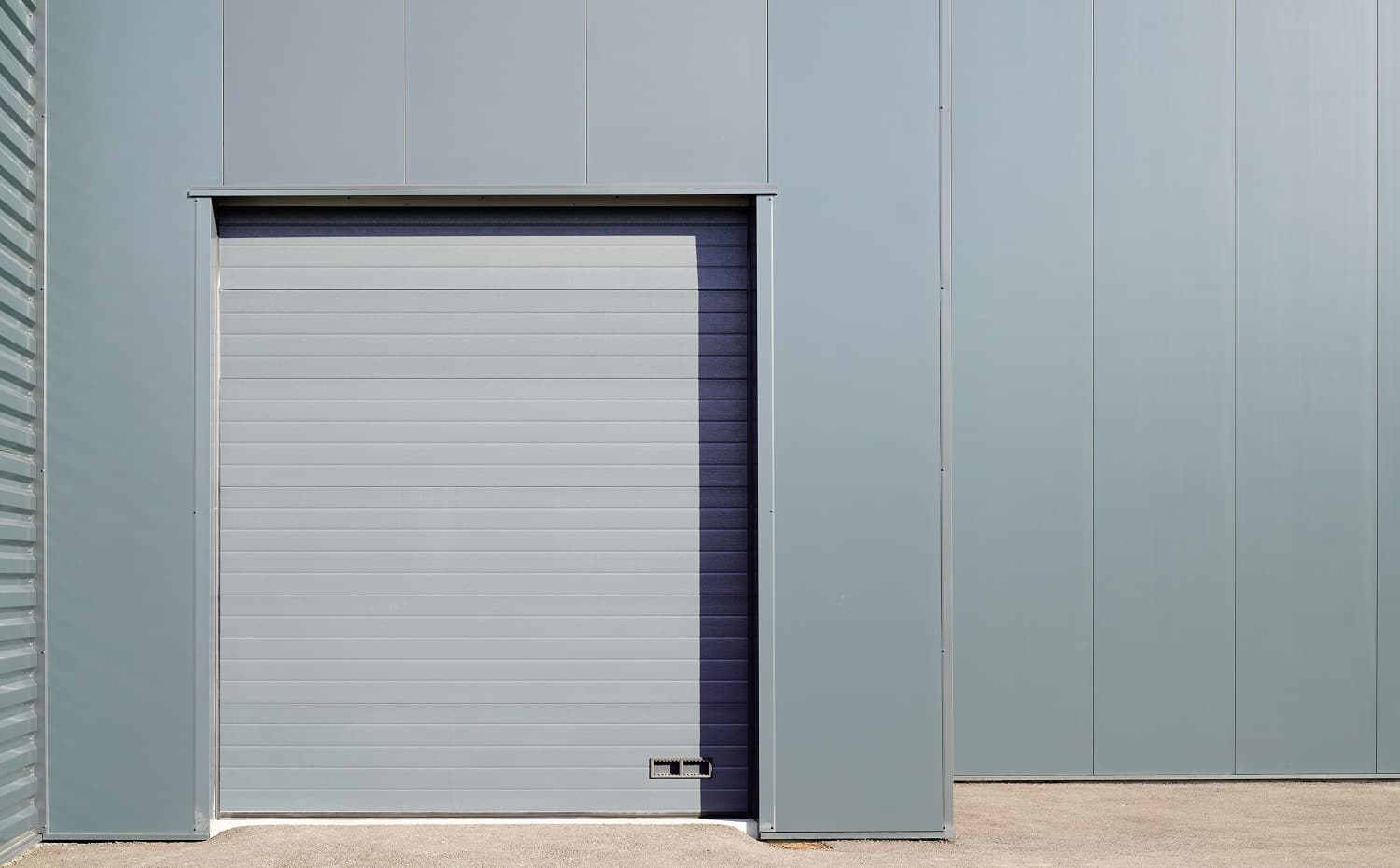 grey metal roller door factory storage garage gray industrial warehouse. Top Garage Door Seal Verdict.