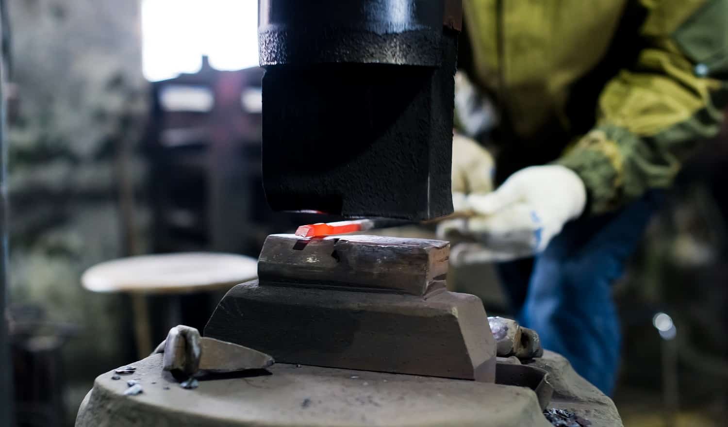 Blacksmith forges in hydraulic press
