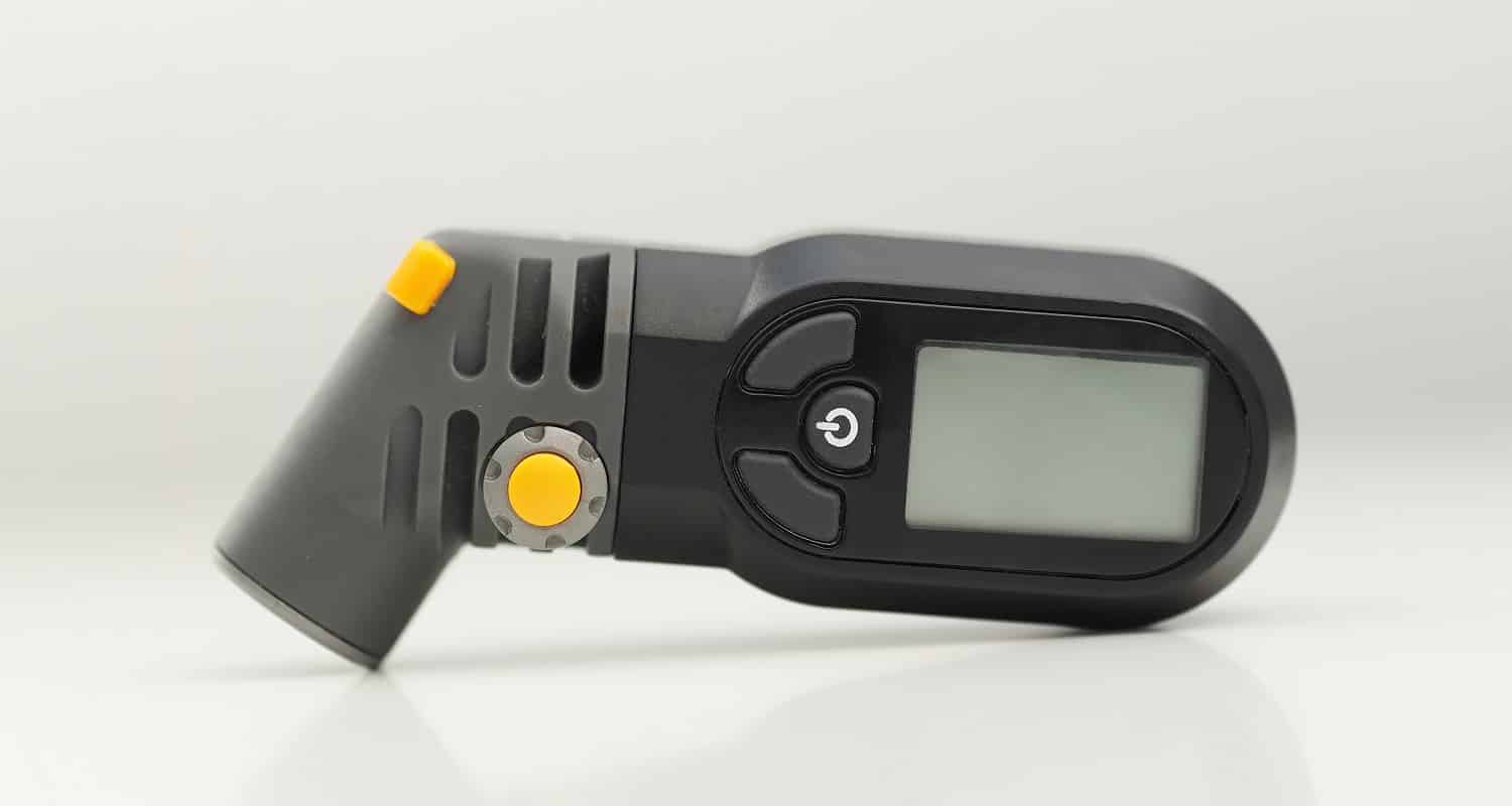 Portable modern digital tire pressure gauge to inspection measure quantity proper tire Inflation for car.