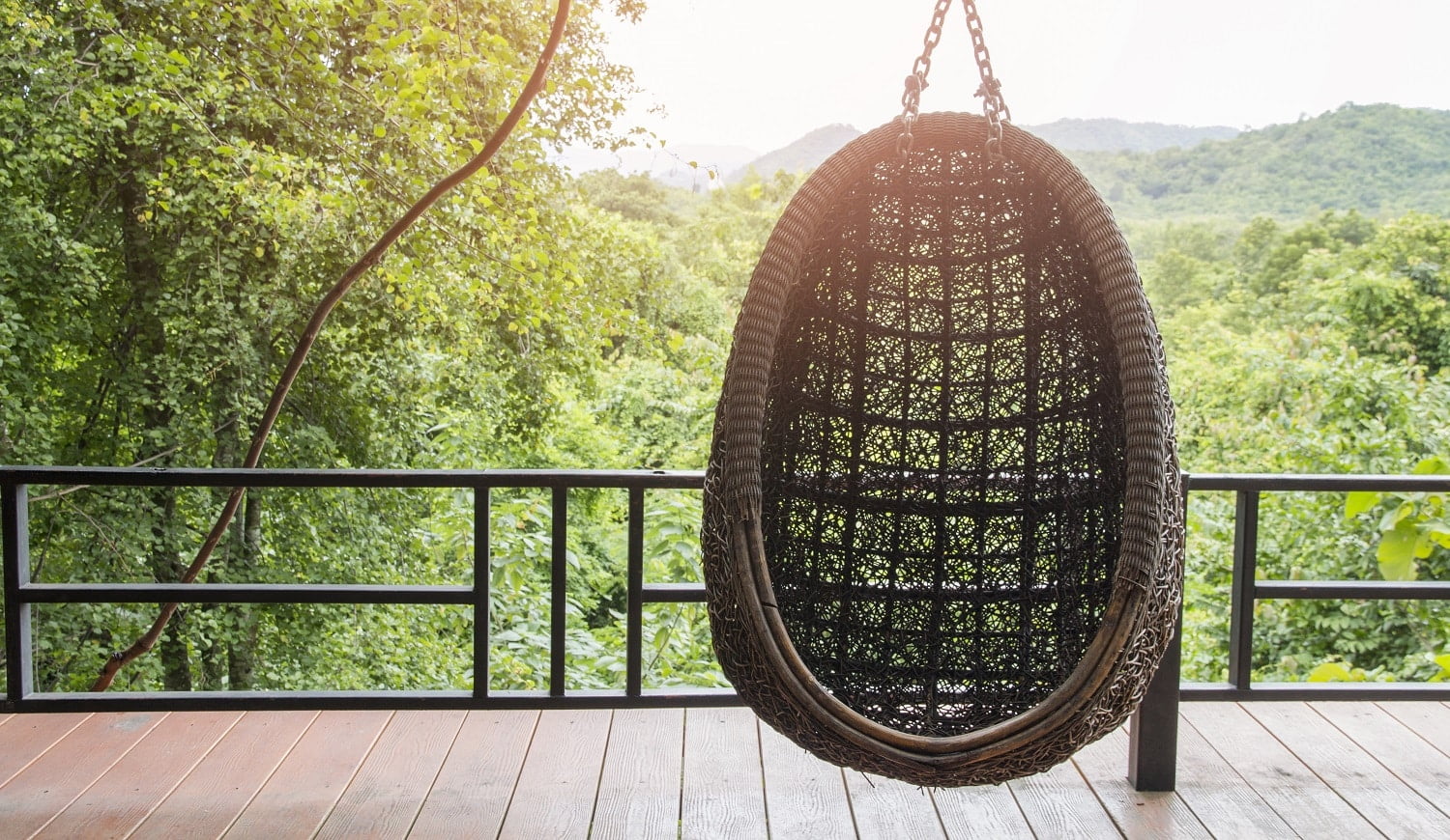 hanging chair in the balcony with nature view.