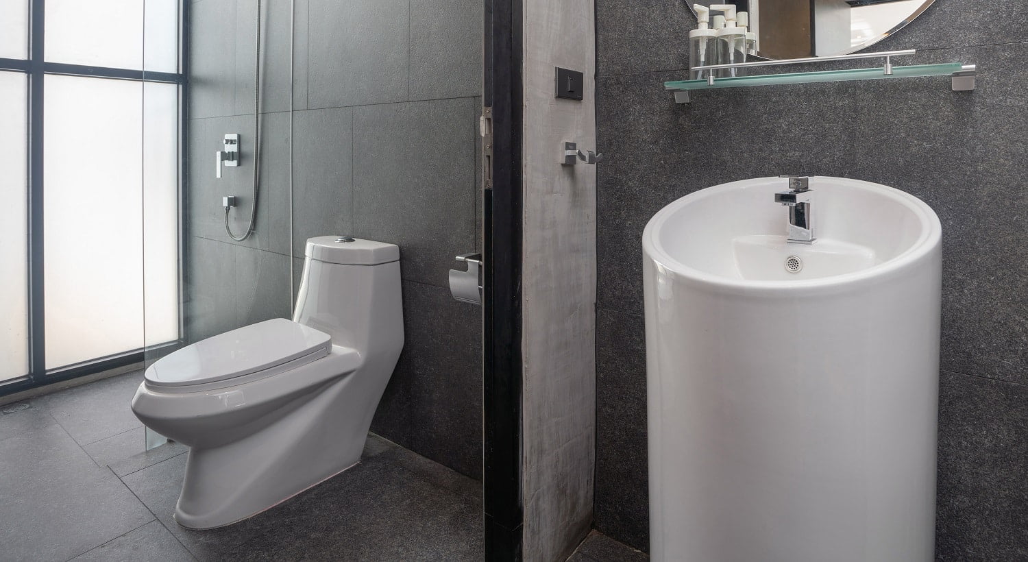 Luxury bathroom features basin, toilet bowl