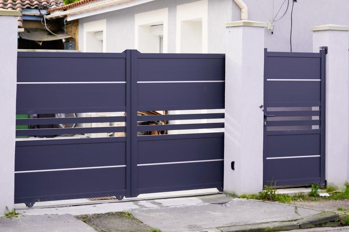 door modern steel aluminum grey gate portal of suburb house. Verdict on the Best Automatic Gate Opener Remotes