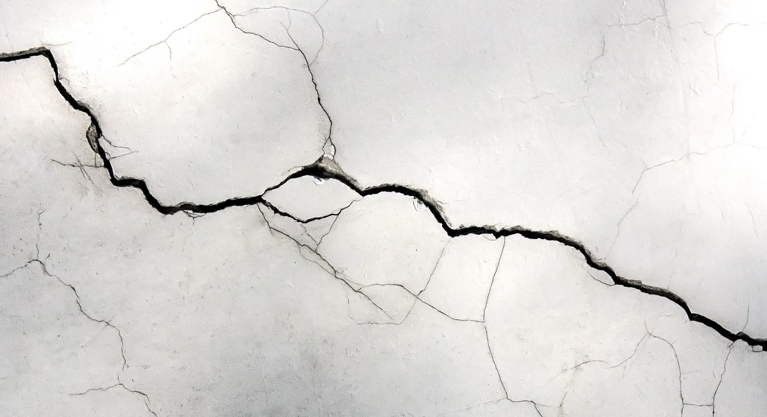 Grunge concrete cement wall with crack ,for your design and texture background