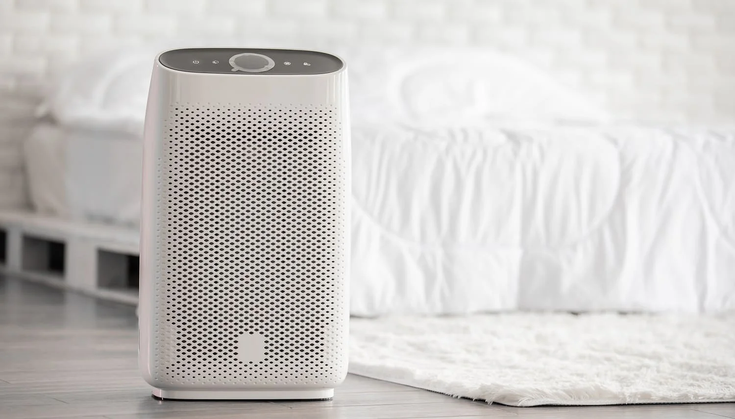 Air purifier in cozy white bed room for filter and cleaning removing dust PM2.5 HEPA in home,for fresh air and healthy life,Air Pollution Concept