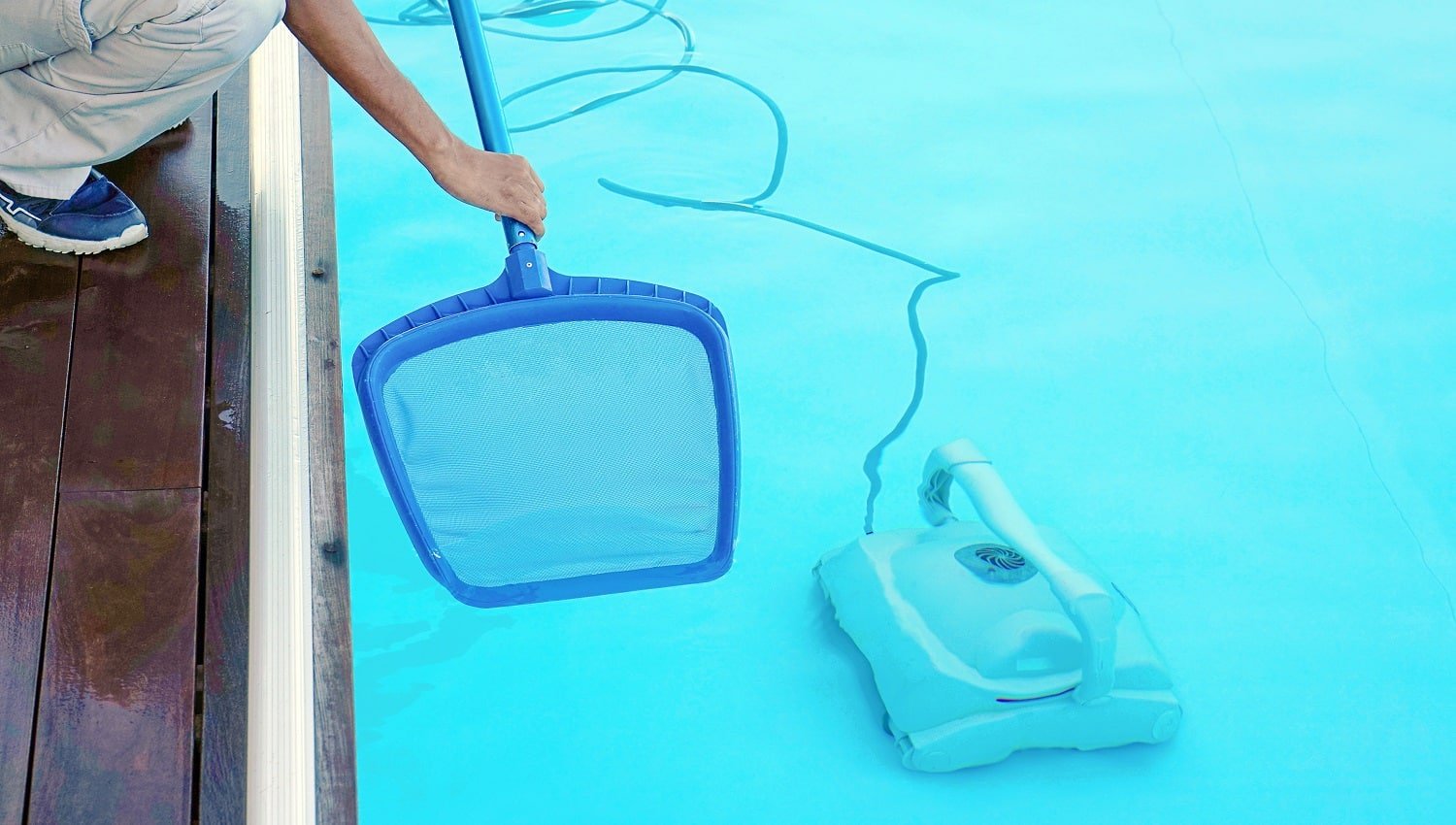 Pool cleaner during his work. Cleaning robot for cleaning the botton of swimming pools. Automatic pool cleaners.