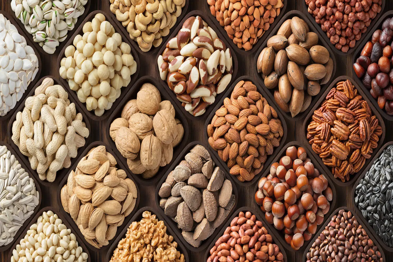 assorted nuts background, large mix seeds. raw food products: pe. Types of Nuts