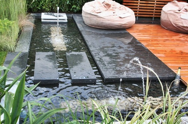 Water Fountain With Regular Steps And Stones