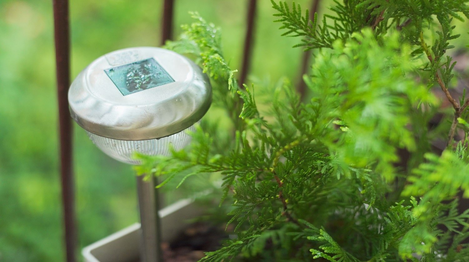 Lamp on the terrace in raindrops, garden lamp solar powered.