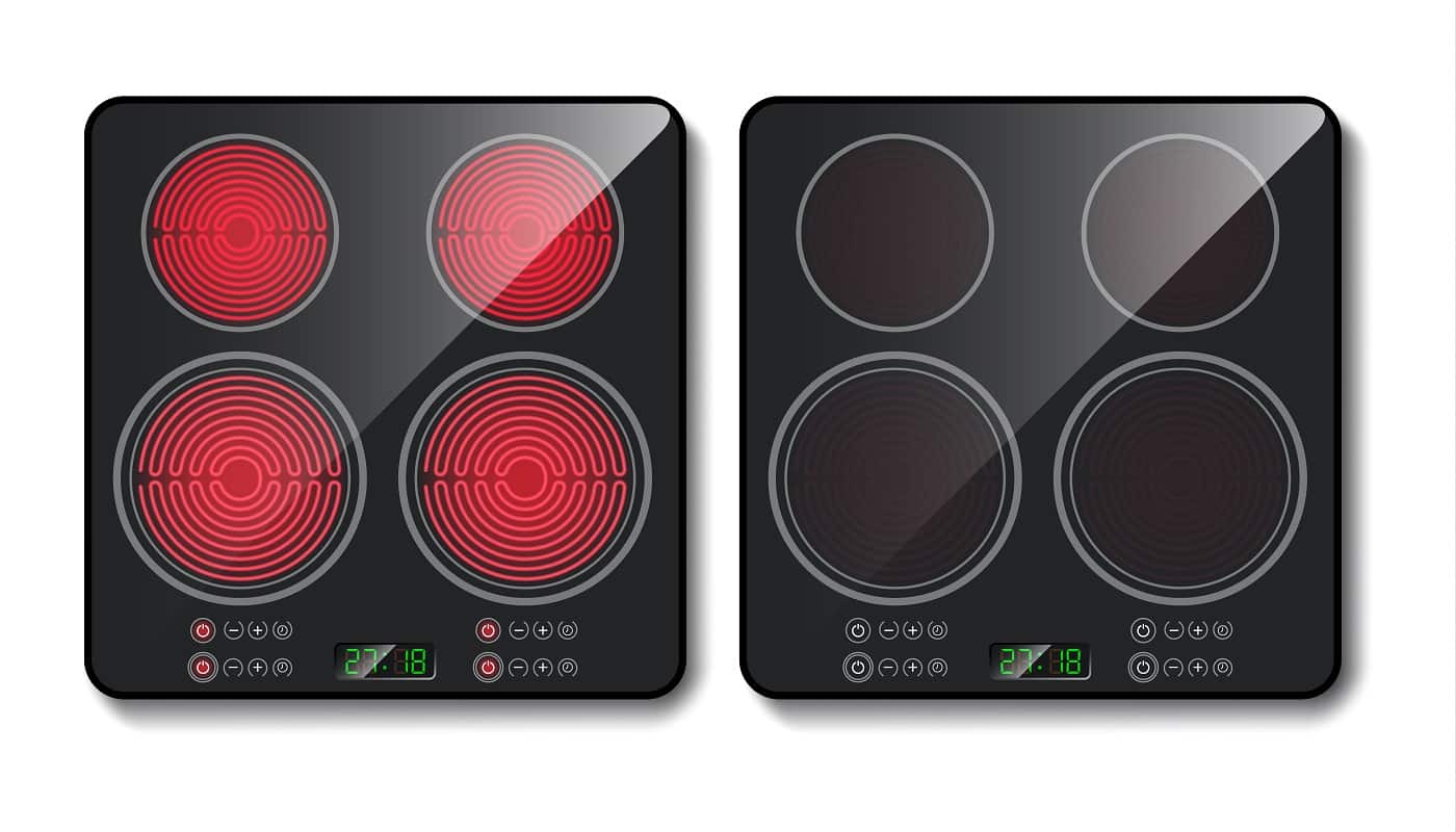 Vector realistic black induction cooktop or glass-ceramic cooking panel, hob with four heating zones, isolated on background. Modern household appliance for cooking food with sensory control buttons