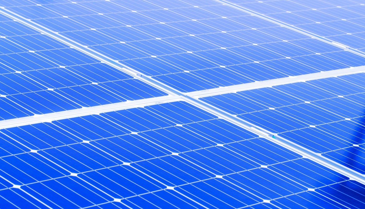 white with blue solar panels, background image