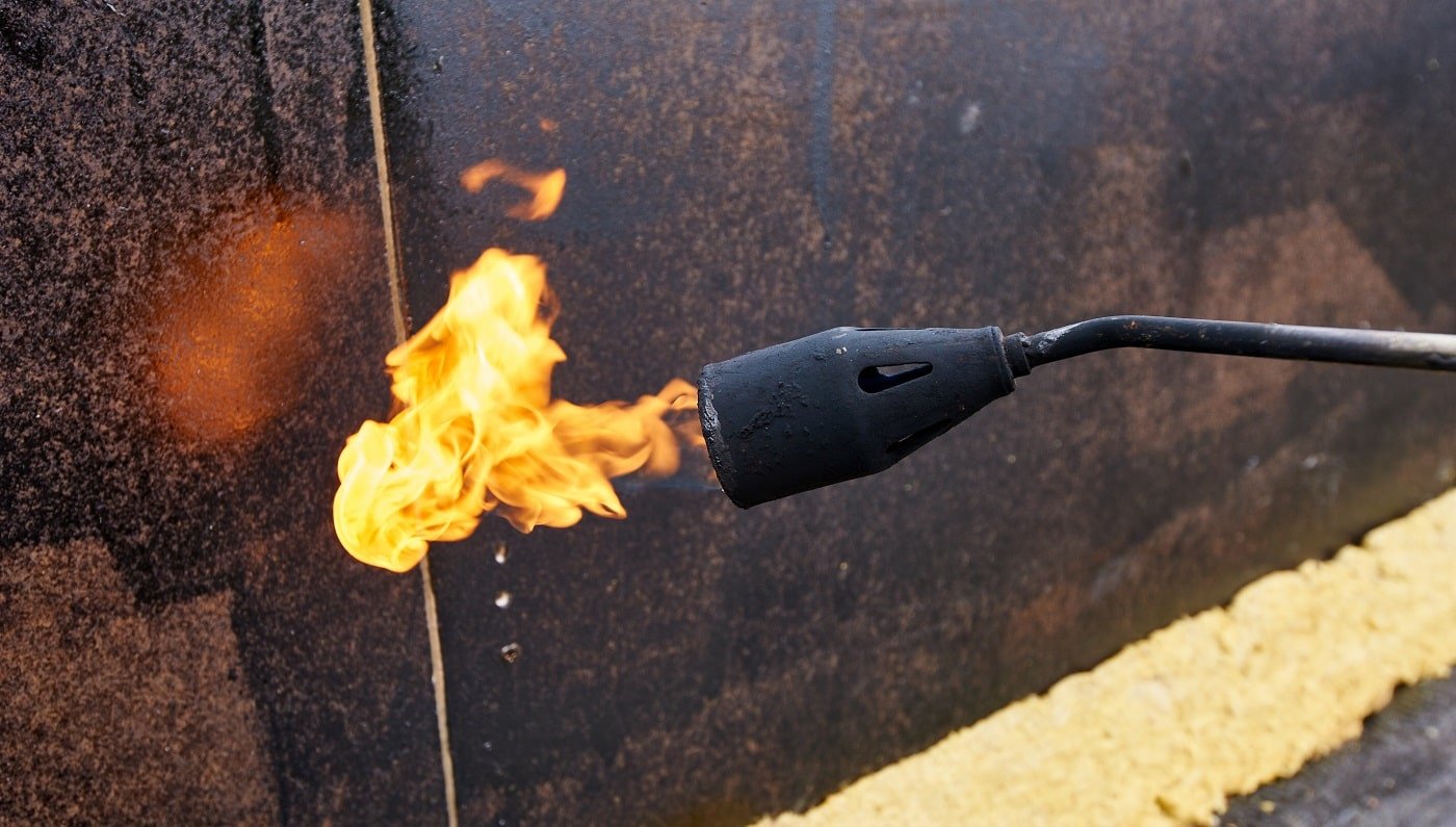 best propane blowtorch close up during construction works.