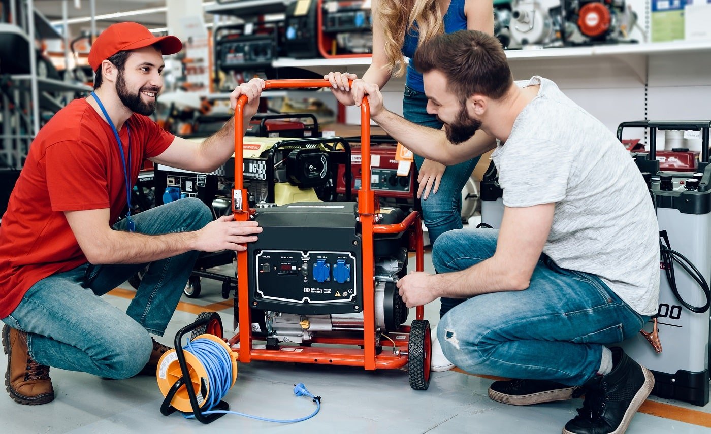 Salesman is Showing Couple of Clients New Generator.