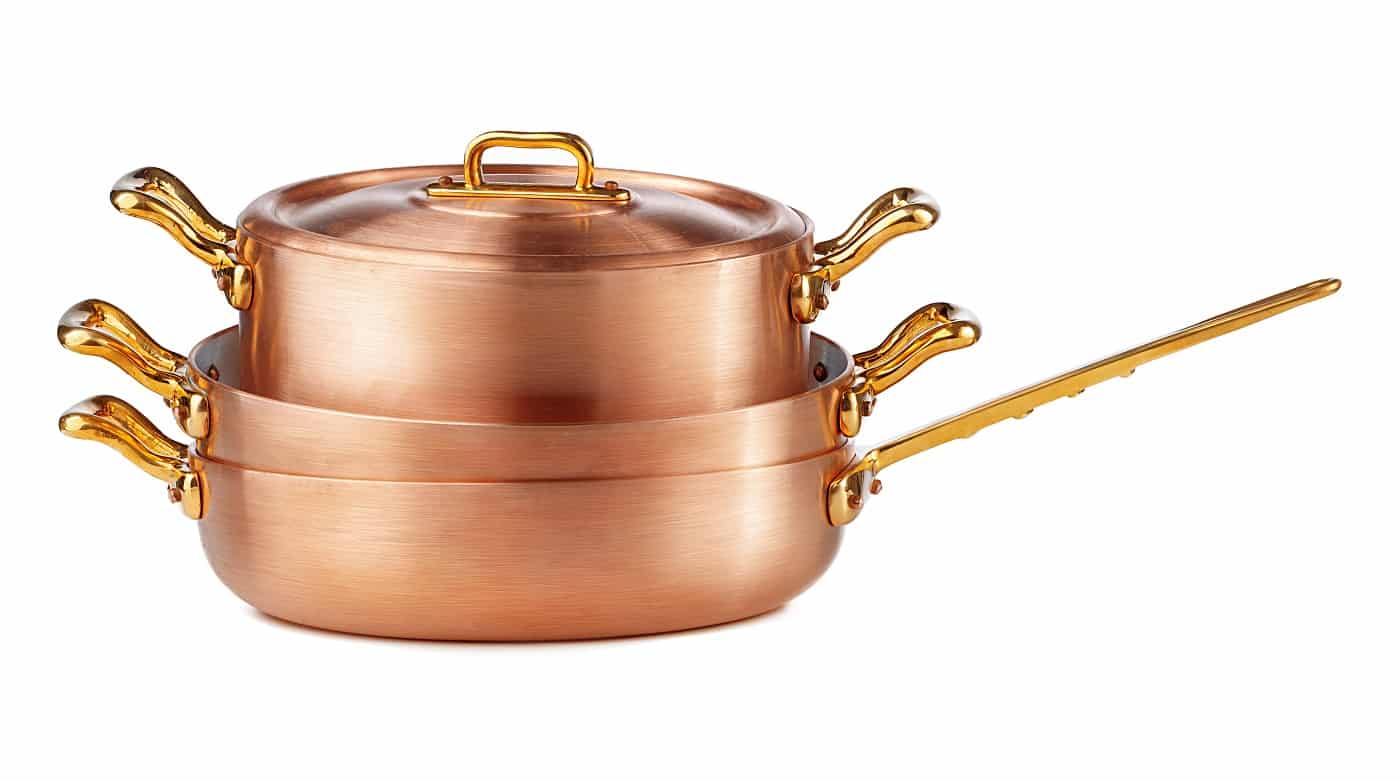 Clean and shiny copper pot isolated on white background