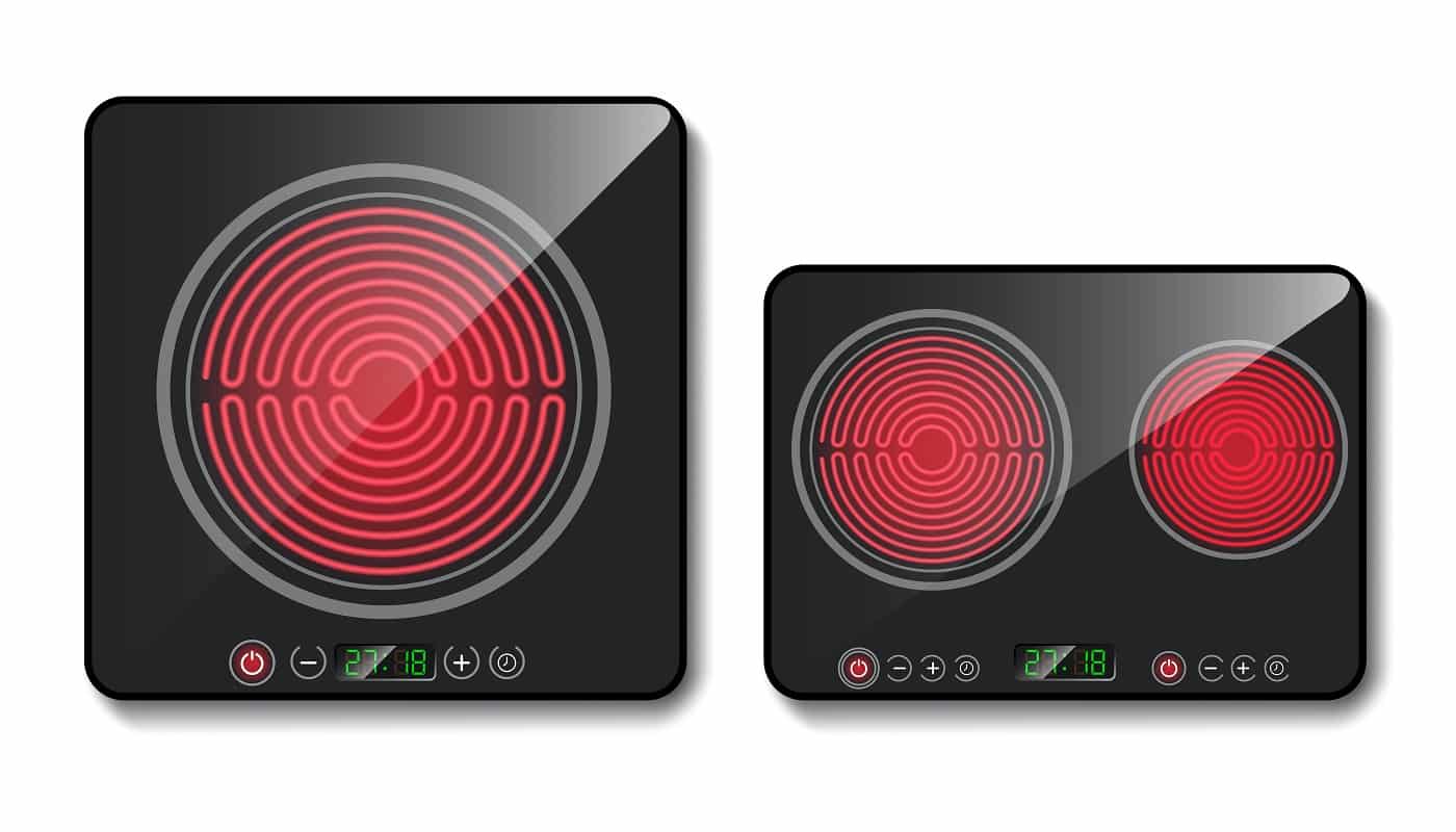 Vector realistic black induction cooktops or glass-ceramic cooking panels, hobs with one and two heating zones, isolated on background. Modern stove for cooking food with touch control buttons