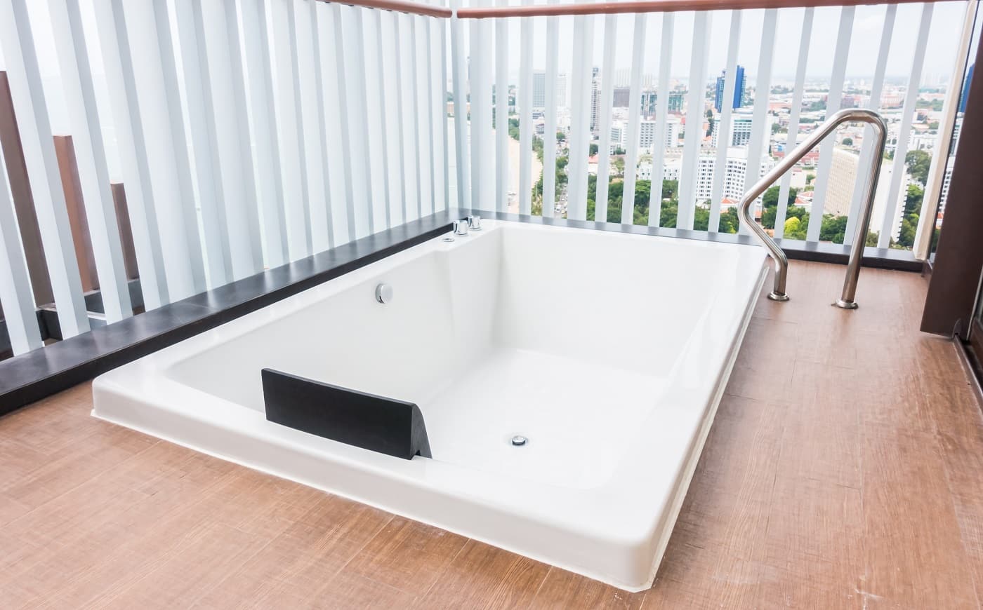 White bathtub decoration with outdoor view at patio and terrace