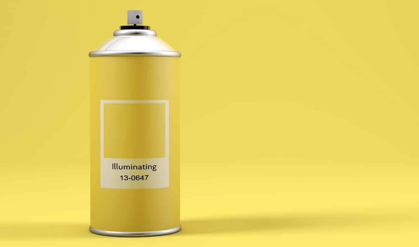 Spray paint can with the color of the year 2022 called Illuminating Yellow