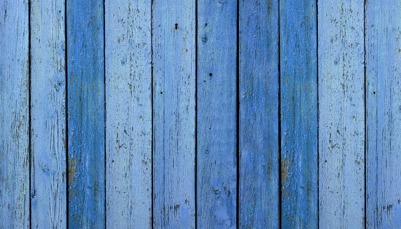 blue very old painted boards with peeling and cracked paint. Abstract vintage backdrop, banner