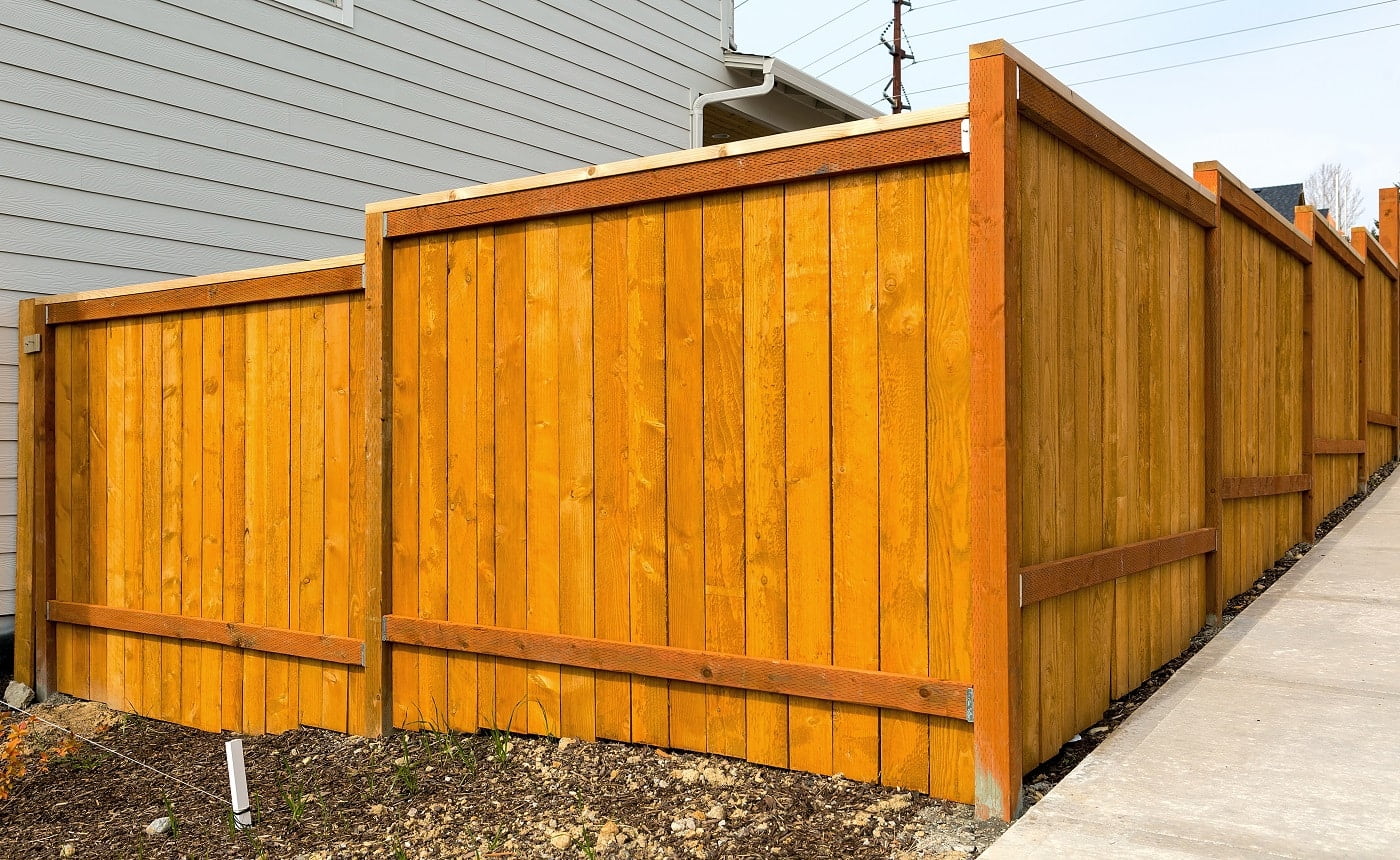 New home backyard wood fence construction