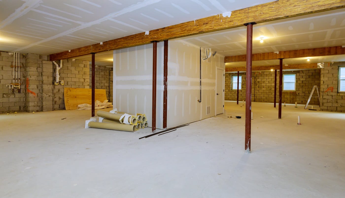 Unfinished basement framing interior wall new home construction Basement Cement Floor Paints