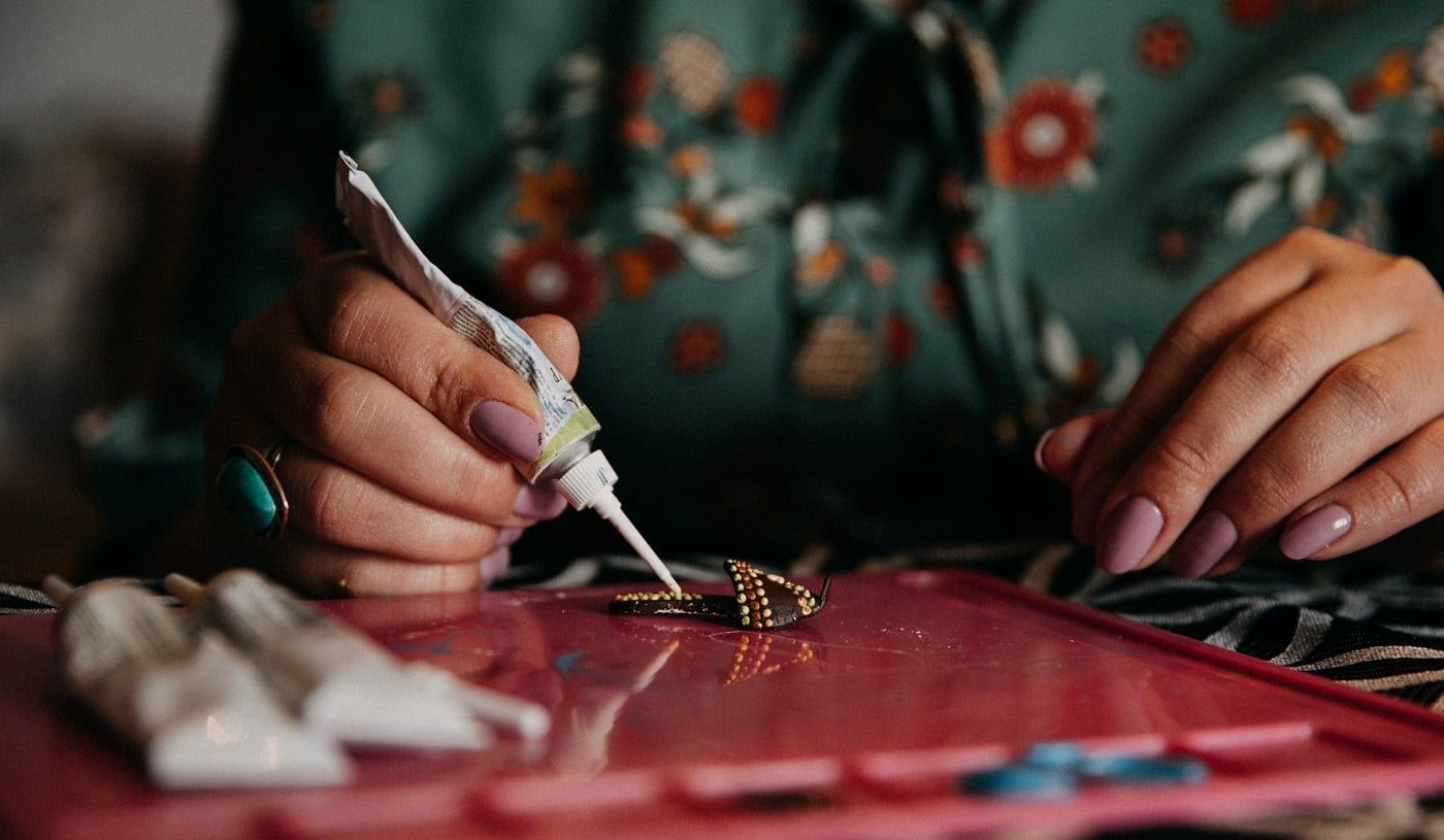 Woman making crafts with the help of the Best Fabric Glue 