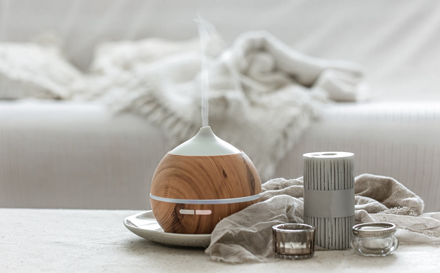 Still life with an aroma diffuser to humidify the air and interior decor details in a Scandinavian style.