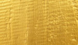 gold paint on texture wood