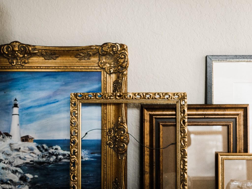 How To Arrange Framed Photos On Walls 7