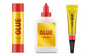 Different types of branded glue tubes with gold label and red cap realistic vector set isolated on white background. Paper glue stick, stationery liquid glue and super glue template, product mockup