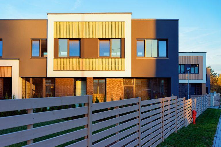 Apartment residential houses home architecture with entrance gate concept.