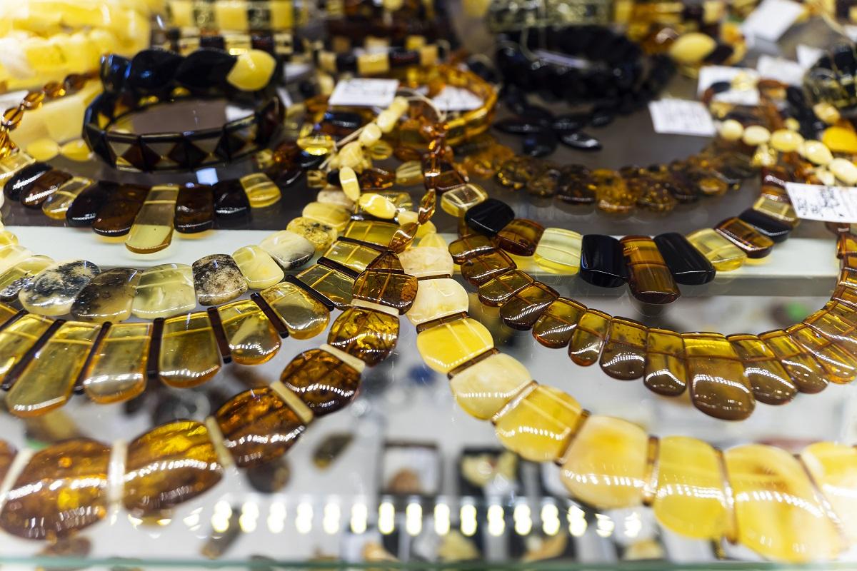 Natural amber on the table. Jewelry made of amber.