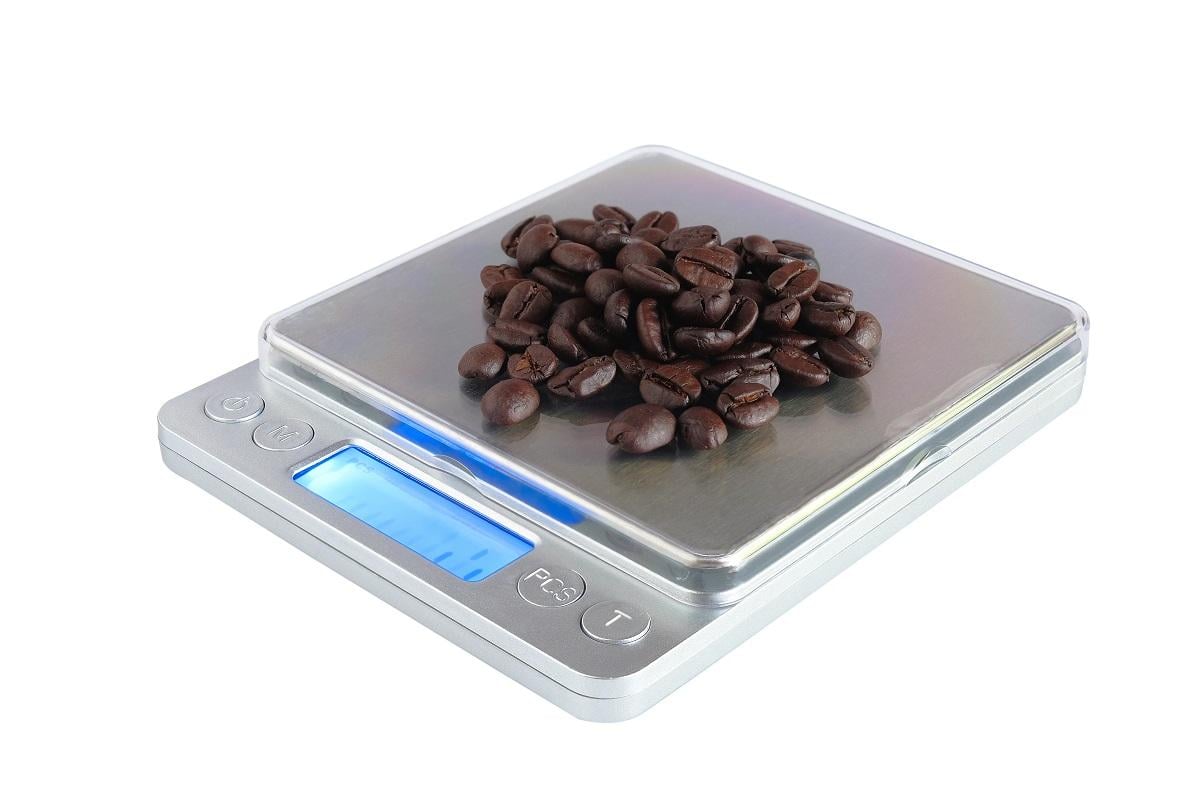 Small digital weighing scale for coffee measure.