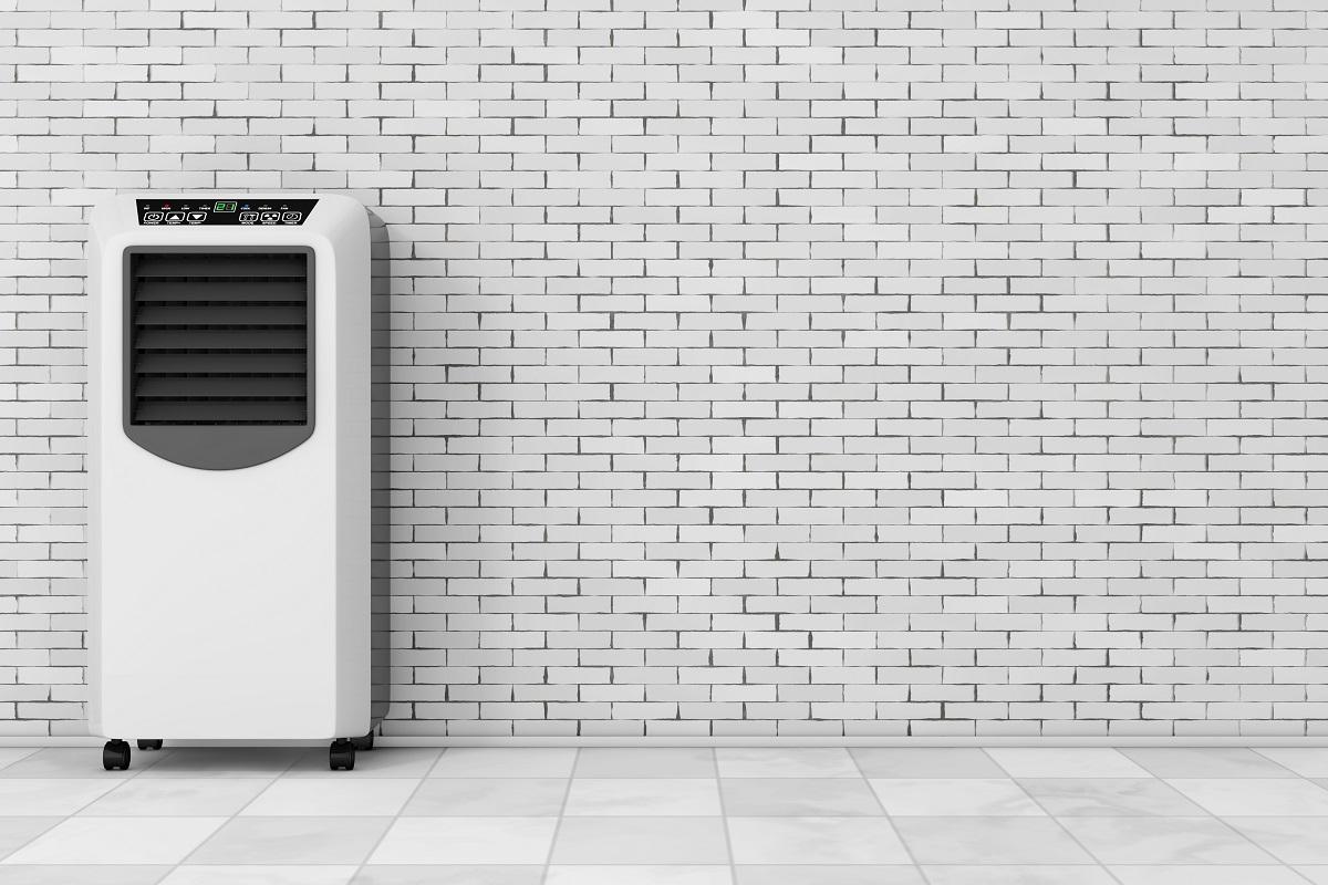 Portable Mobile Room Air Conditioner in front of brick wall. 3d Rendering.
