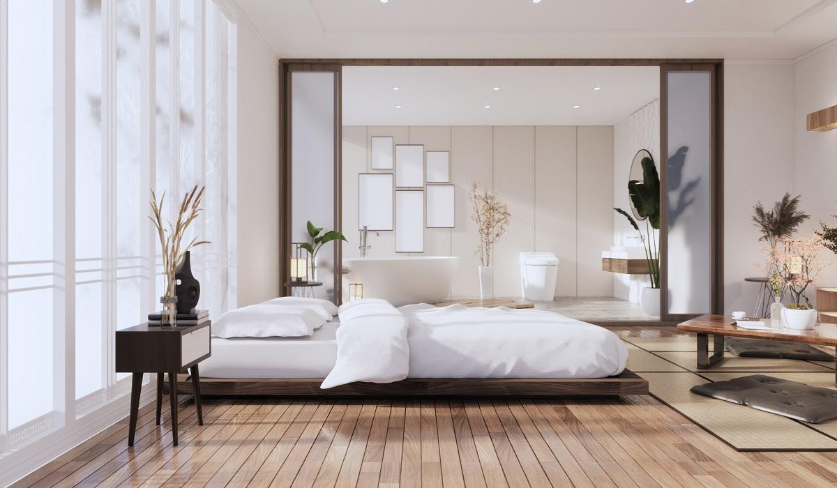 Modern Zen bed and decoartion plants in japanese bedroom. 3D rendering.