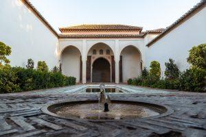 Courtyards. Beautiful courtyard with water fountains inside the Alcazaba in the city of Malaga, Andalusia. Spain. Medieval fortress in arabic style