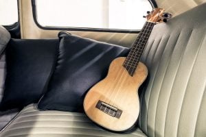 Ukulele on seat vintage car with pillows. Car Seat Cushions Buying Guide