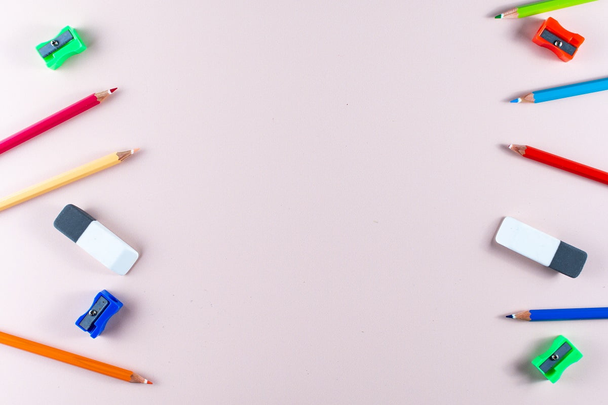 Top view of a set of school supplies with copy space. Colored Pencil Erasers.