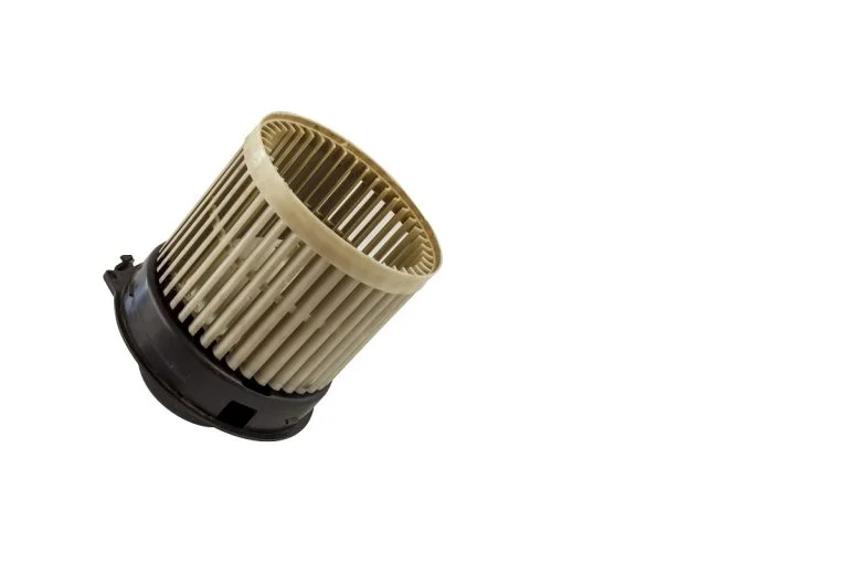 Old air car blower motor isolated on white background. Old dirty air blower fan motor of car isolated. Save with clipping path. Best Blower Motor For Car 1.