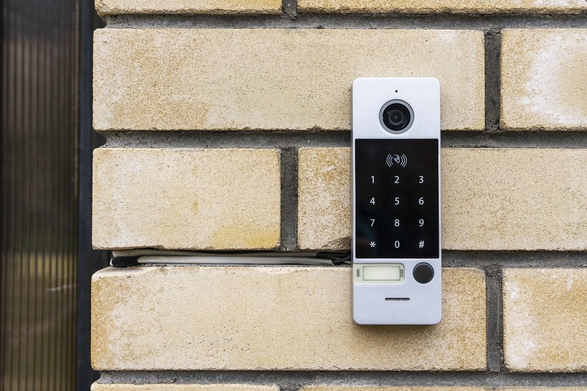 an intercom on the door of a private house, an intercom panel with a video camera on a brick beige fence post of a private house. Drawbacks Of Wireless Doorbells.