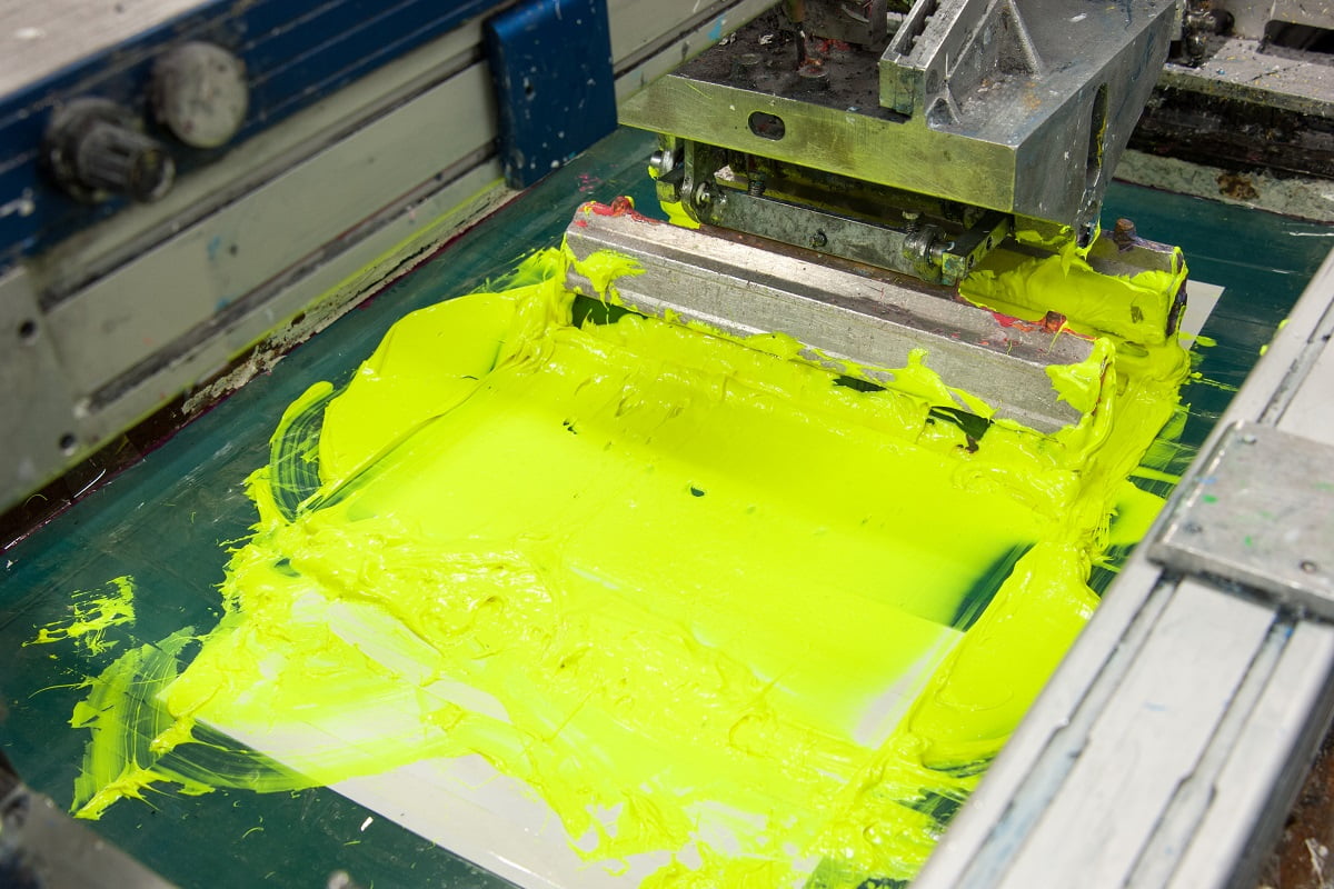 equipment and machines for painting cloth at a garment factory closeup. Screen Printing Vs Laser Printing Conclusion.