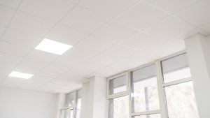 Acoustic ceiling with lighting and light channel window, Acoustic ceiling board texture Sound-proof material, Sound absorber, industry construction concept background black and white tone. Ceiling Soundproofing Final Words