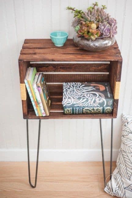 Rustic crate nightstand elevated on hairpin legs