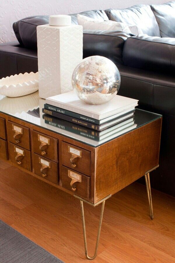 Vintage card catalog drawer unit used as bedside table on hairpin legs